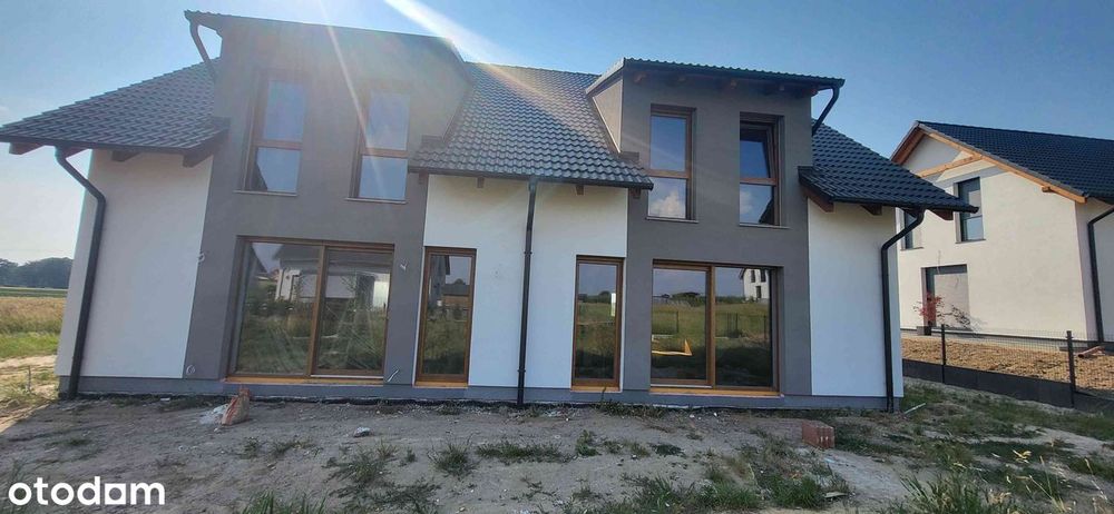 Nowoczesny dom w zabudowie bliźniaczej 115m² z pompą ciepła