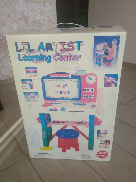 Дитячій стіл з функцією креслення