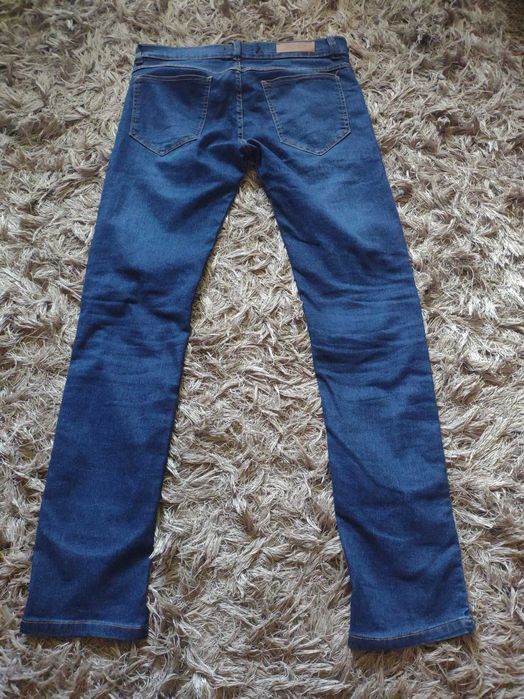 Mega okazja !  Spodnie  jeansy   Boss  Jeans    31