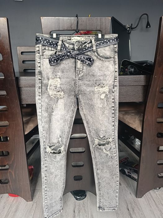 Spodnie damskie jeansowa z dziurami