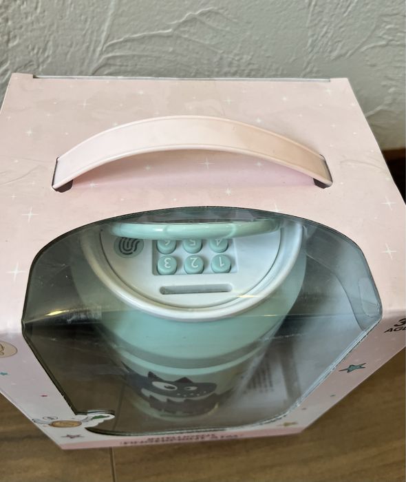 Играшка Копілка-сейф динозаврик з музикою та світлом