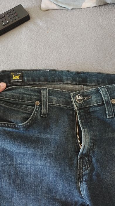 Spodnie Lee ze streczem 40cm w pasie długość 98cm W28 L31