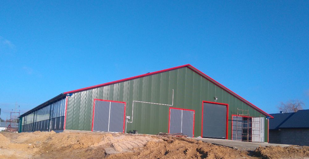 Budowa budynków inwentarskich , obór dla krów, silosów MLEKO-SYSTEM