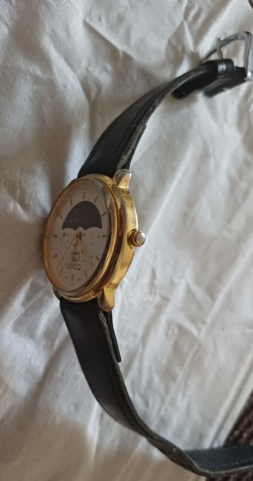 Zegarek Gucci piękny ze zmienna tarcza noc/dzień