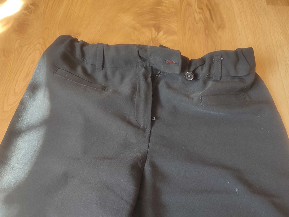 Lekkie dzwony z wysokim stanem czarne spodnie damskie