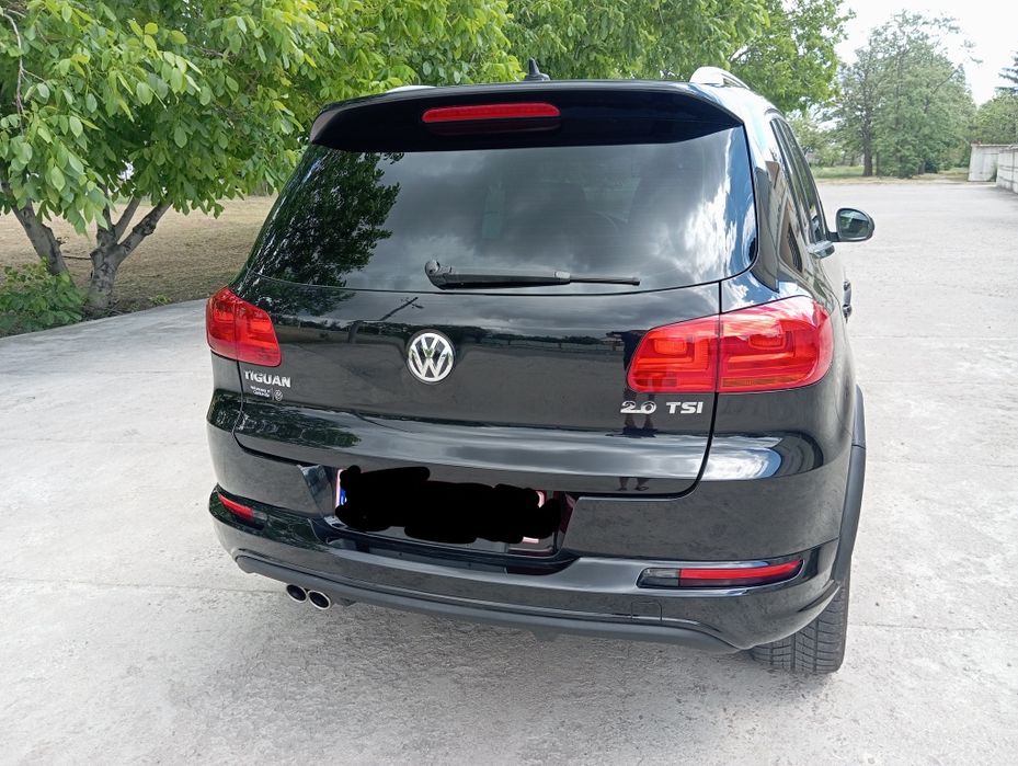 Volkswagen Tiguan 2014 VIN WVGAV7AX4FW009831 фото оголошення 6 з 24