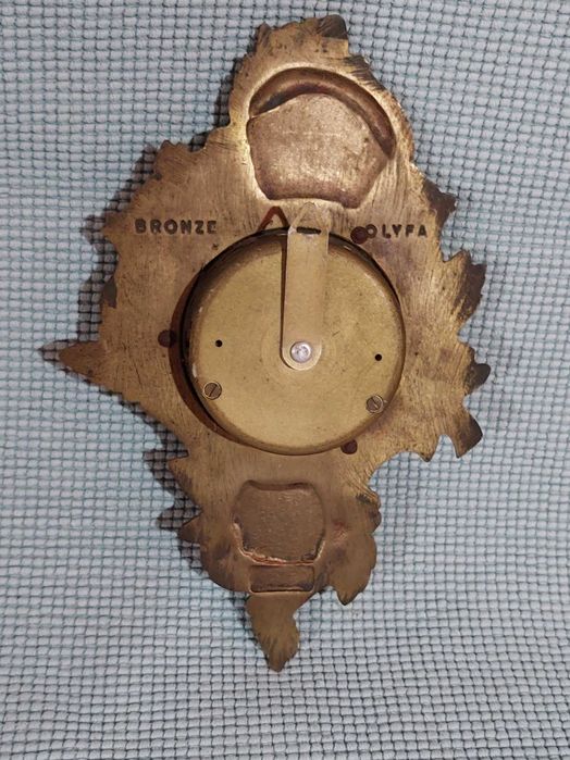 Barómetro antigo em bronze