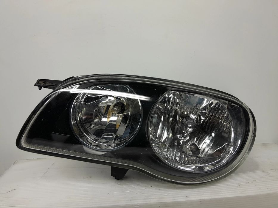 Ótica / farol esquerda TOYOTA Corolla Compact (_E11_)