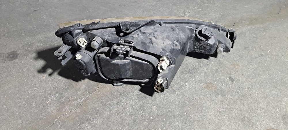 Farol esq. Peugeot 206