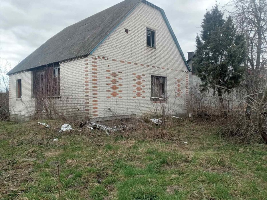 Продам земельну ділянку з недобудованим будинком