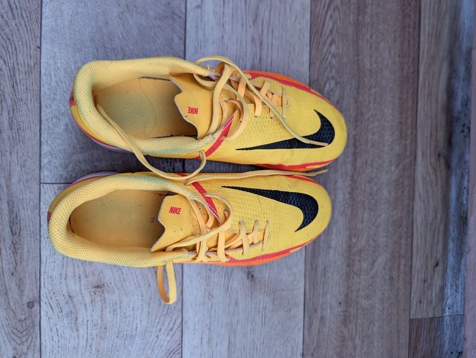 Pomarańczowo żółte Nike
