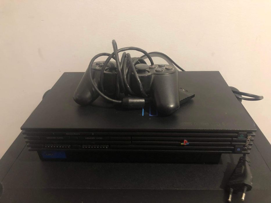 PLAYSTATION 2 sprawne w stanie jak na zdjęciu pad plus mikrofon i gra