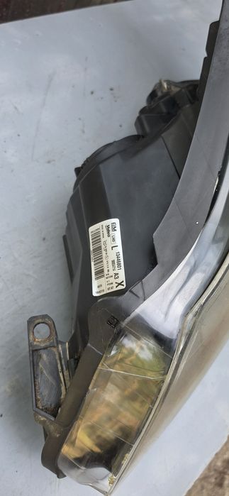Lampa Reflektor Lewa Przód Opel Corsa D Lift EU
