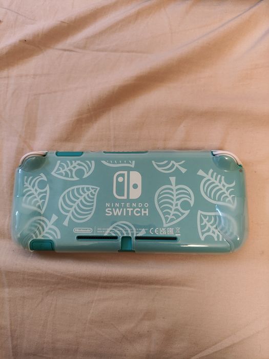Nintendo Switch Lite, como nova e com extras