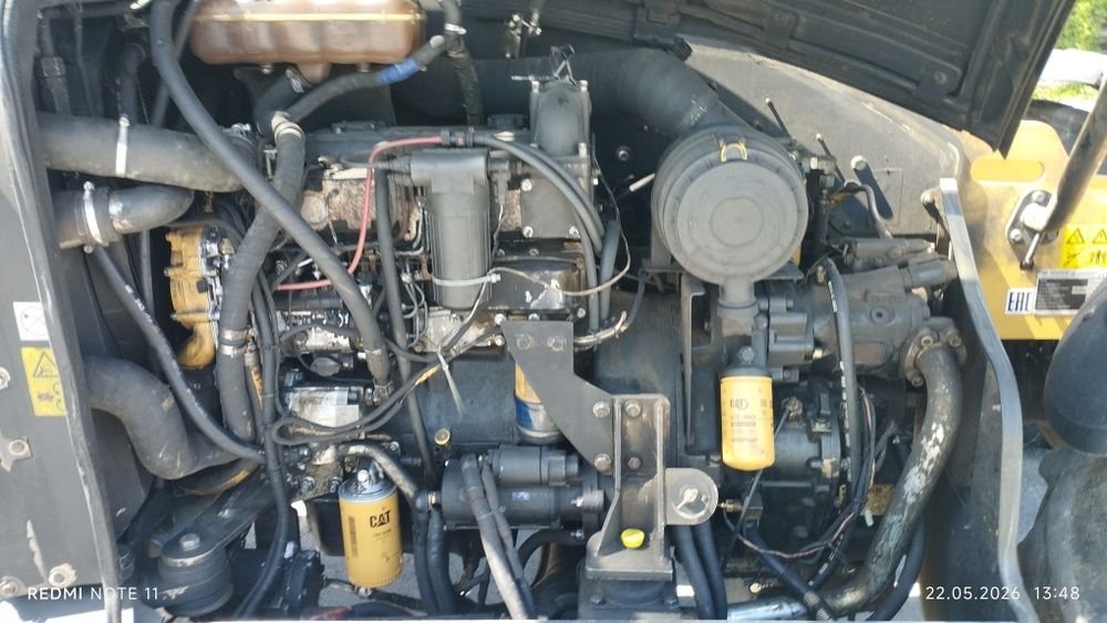 Продам телескопический погрузчик cat 407 c