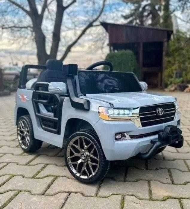Дитячий електромобіль Тойота Крузак пульт музика світло детский EVA