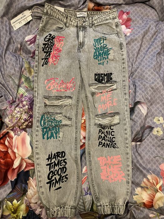 Super spodnie jeans przetarcia Nowe Graffiti rozmiar 38