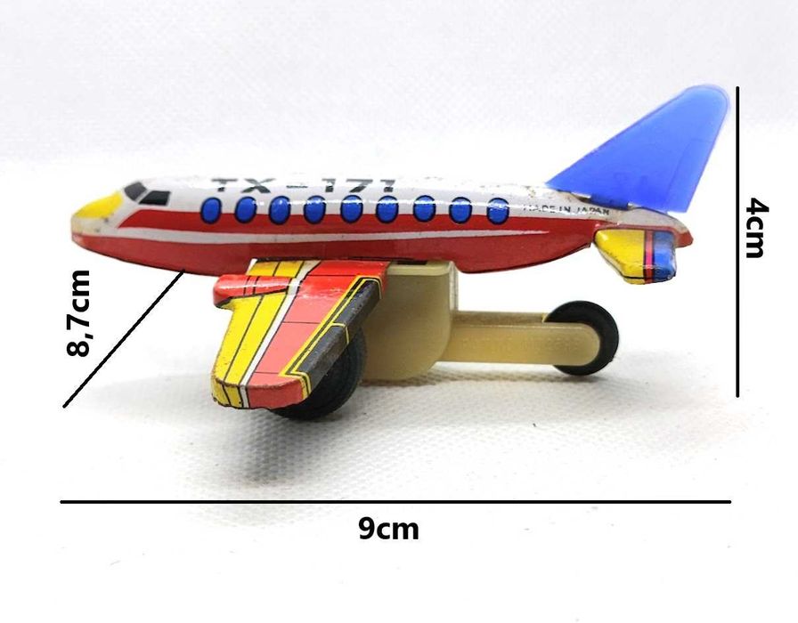Avião brinquedo antigo em lata de fricção TX 171