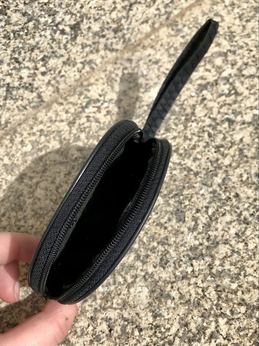 Pequena bolsa de moedas