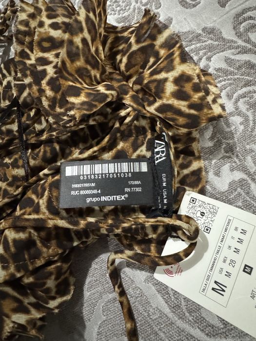 Top  bandeau leopardo da Zara.