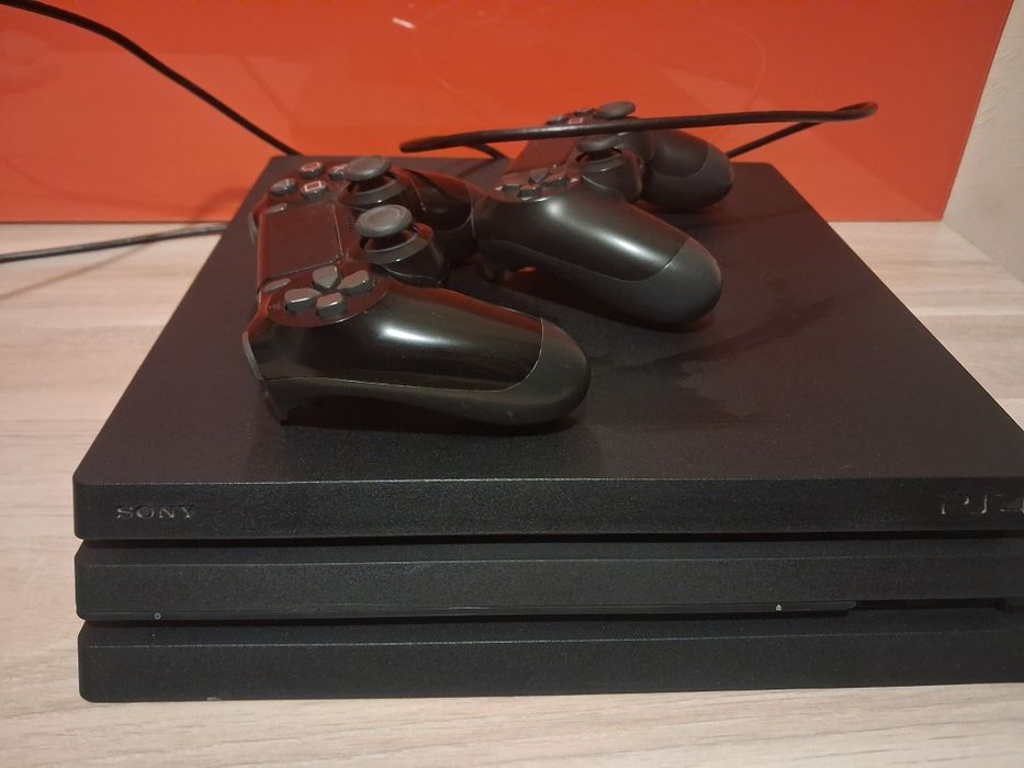 PlayStation 4 Sony i dwa pady