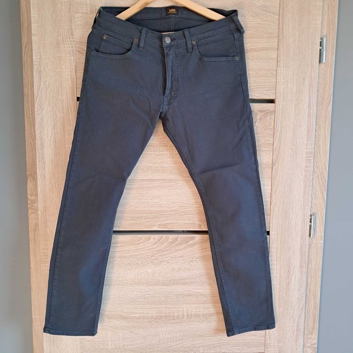 Granatowe jeansy Lee 32/30