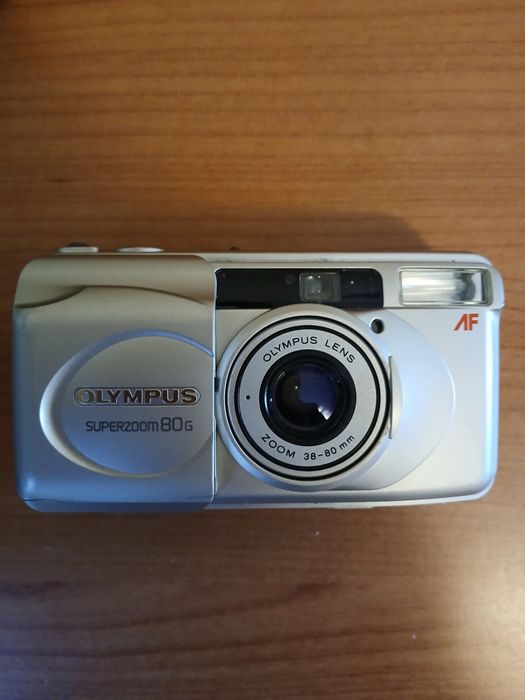 Фотоаппараты Олимпус,Кенон