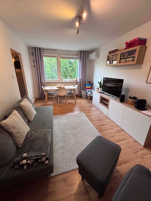 Salon z aneksem kuchennym + sypialnia, balkon, media miejskie, klimatyzacja, miejsce postojowe