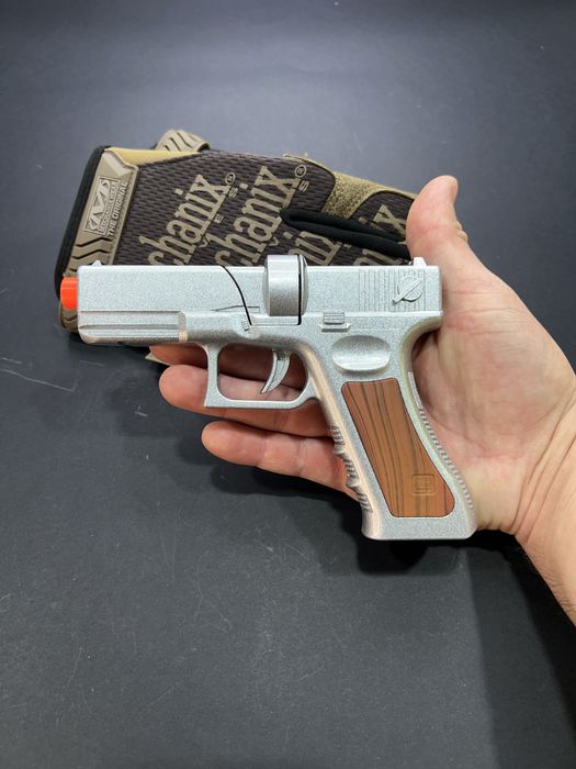 Металевий Глок на пістонах