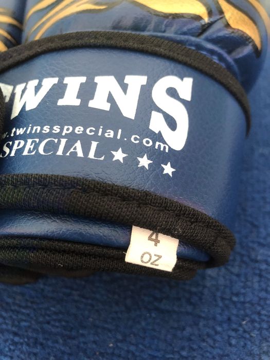 Перчатки боксерські