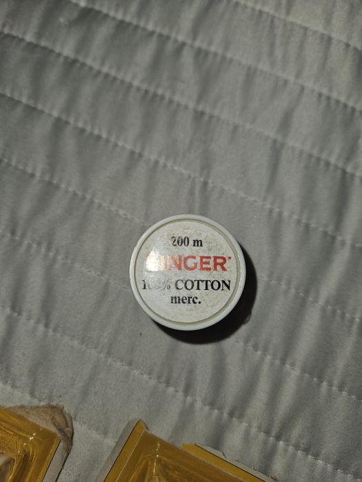 Linha de costura, SINGER