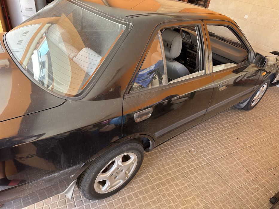 Mazda 323 1.3 a gasolina