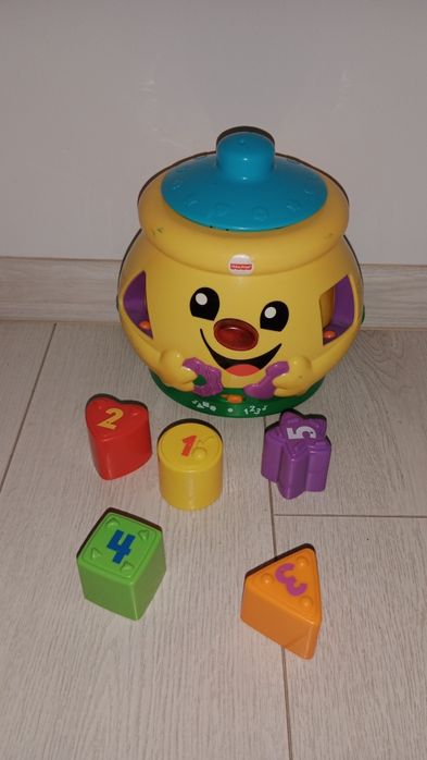 Garnuszek na klocuszek Fischer Price klocki