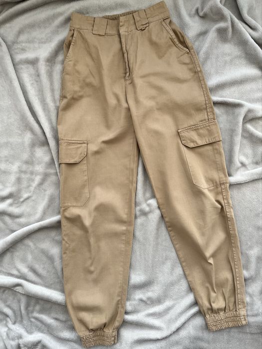 Бежеві брюки карго