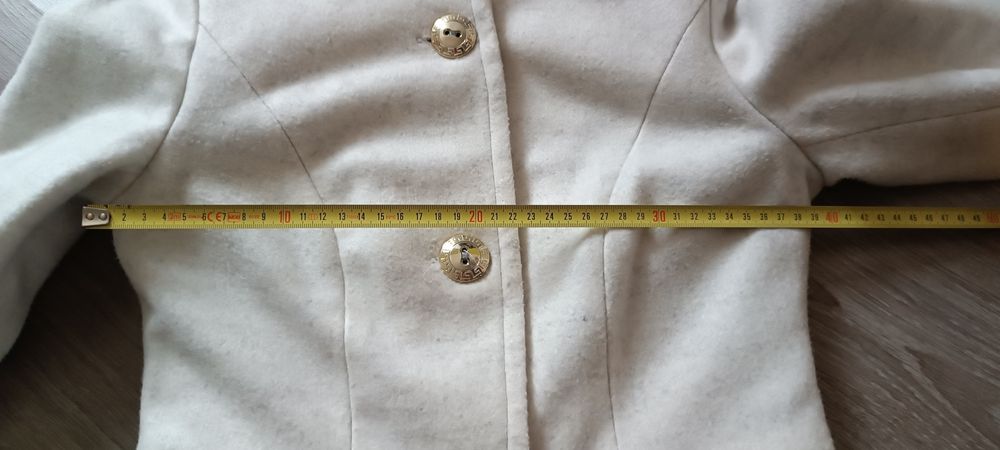 Kremowy płaszcz rozmiar 34