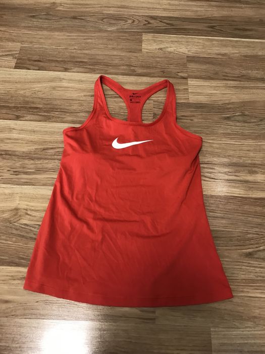 Жіночі спортивні футболки,майки  Nike,Puma,Adidas,Reebok