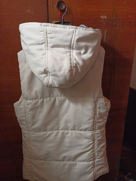 Продам женскую желетку