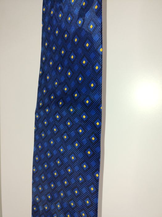 Krawat jedwabny nowy granatowy w kropki z poświatą