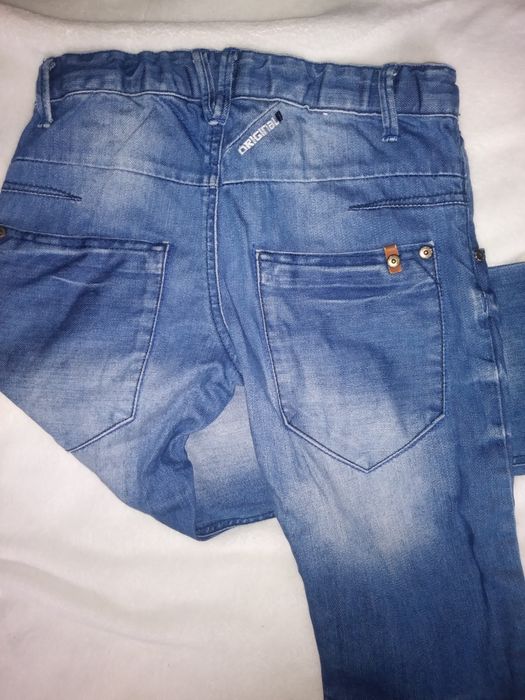 Spodnie jeans 140
