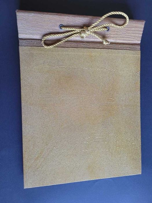 Álbum para fotografias dourado