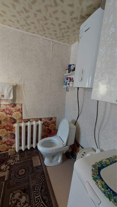 Продам 1/2 частину будинку з гаражем