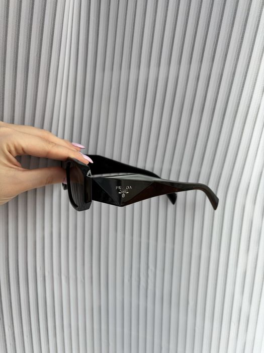 Óculos pretos prada