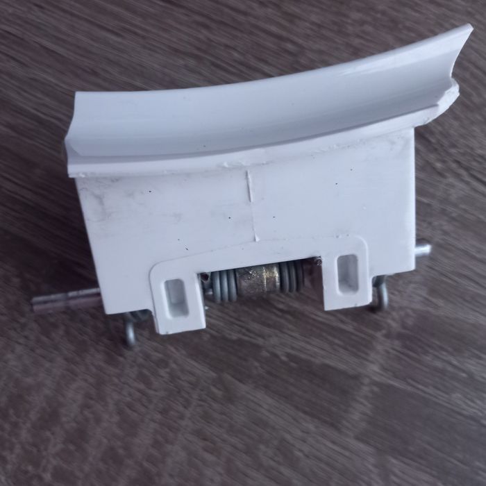 Zaczep do zamknięcia drzwiczek pralki electrolux