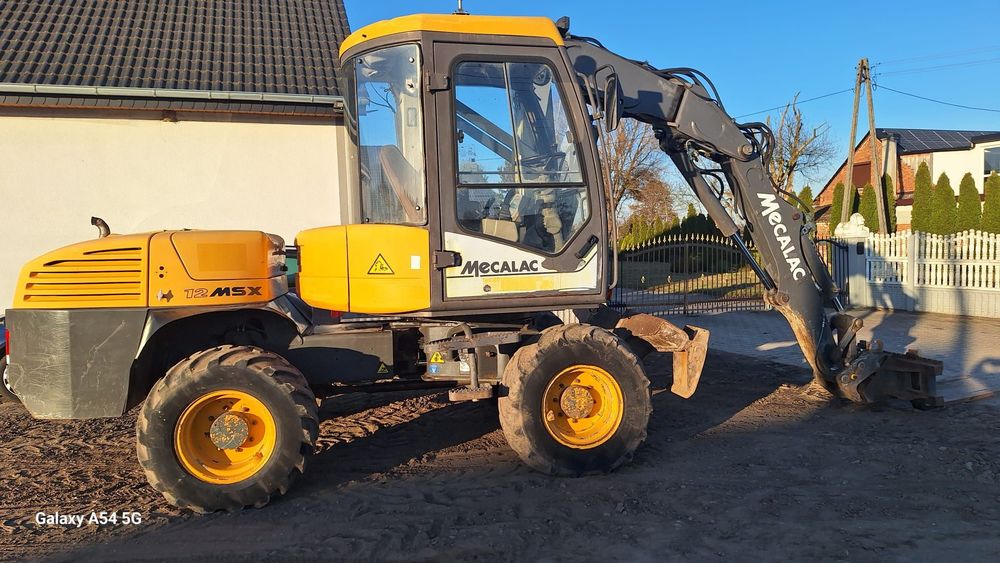 Mecalac 12MTX  Koparko ładowarka Mecalac 12 MTX oryginał BRUTTO zamiana