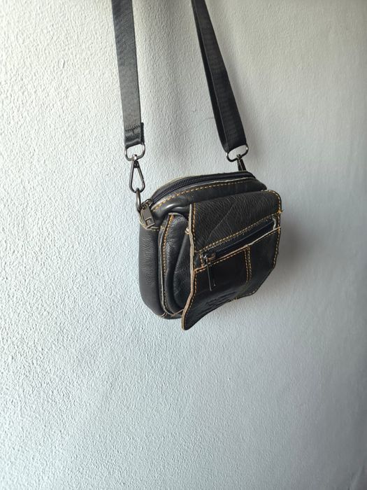 Bolsa de cabedal...