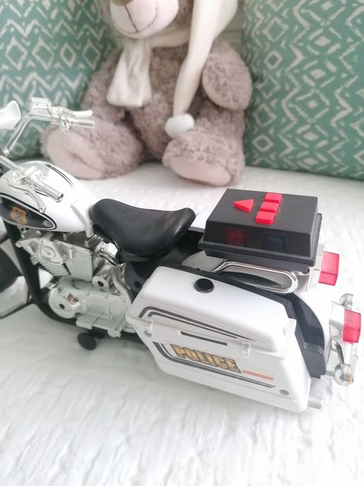 Brinquedo mota de polícia com som e luzes