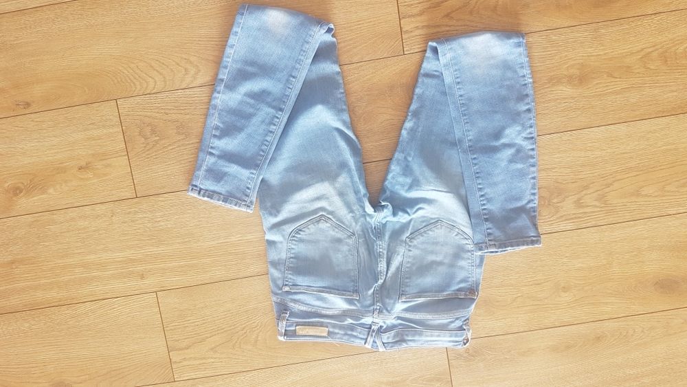 Dżinsy spodnie jeansy zara S z dziurami