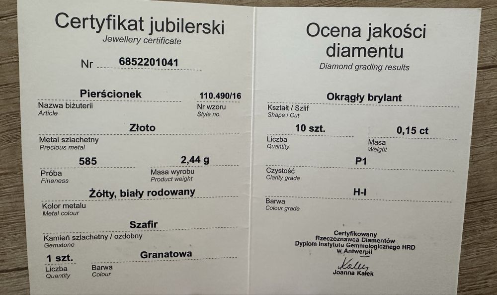 Złoty pierścionek z szafirem i diamentami