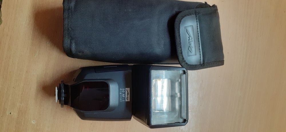 Вспышка Metz-50-1 для Canon