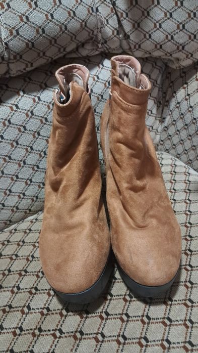 Botas com salto alto
